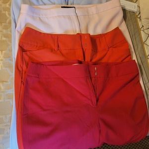 4 pairs of dress pants: red orange, red,  pink, and blue; beautiful pants!
